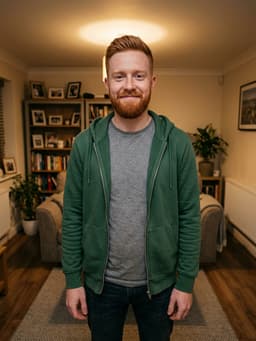 AI-generated young man with ginger hair and beard in a green hoodie